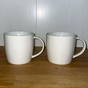 Set of 2 - 2009 Starbucks Embossed New Bone China mugs 16 oz